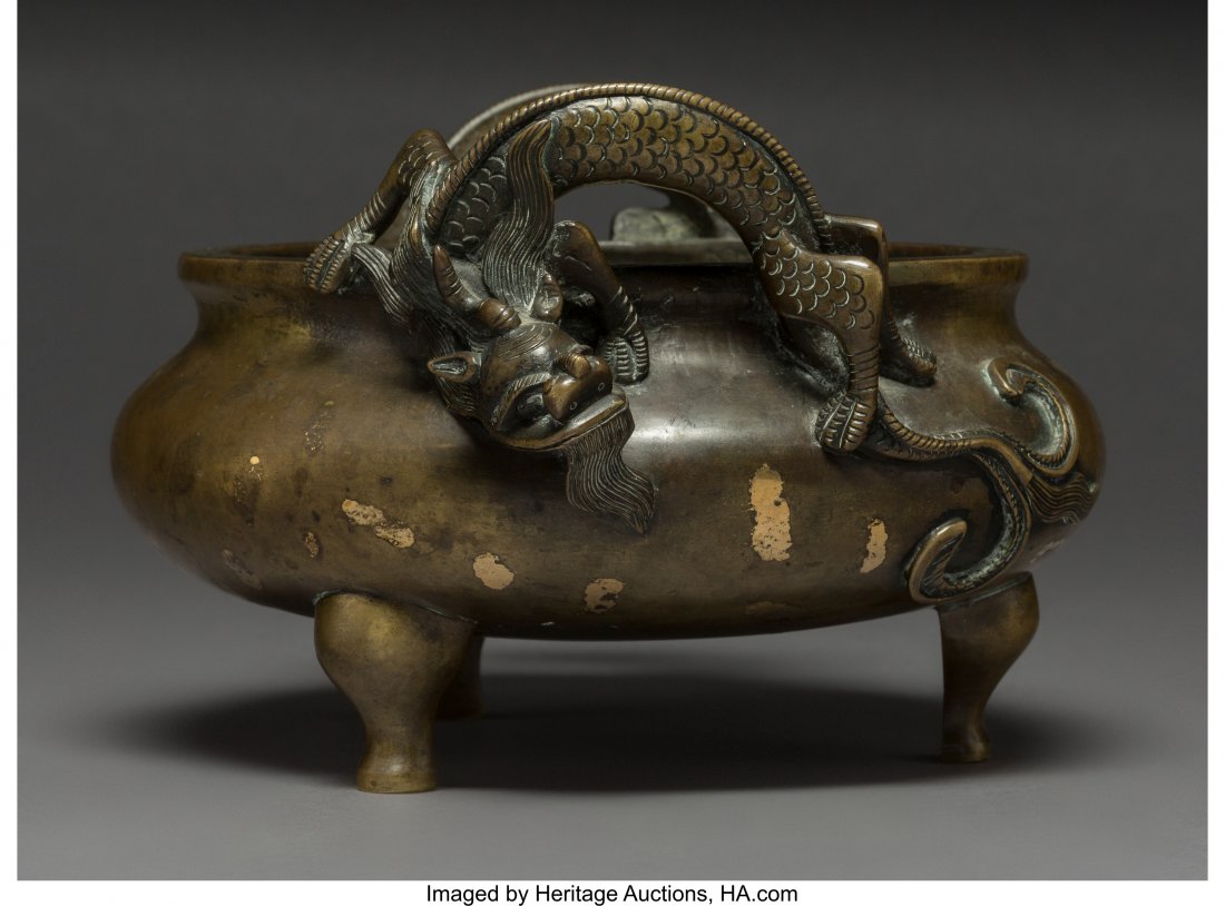 A Chinese Gold Splashed Bronze Tripod Censer wit: A Chinese Gold Splashed Bronze Tripod Censer with Chilong Handle Mounts, Qing Dynasty, 18th ce
