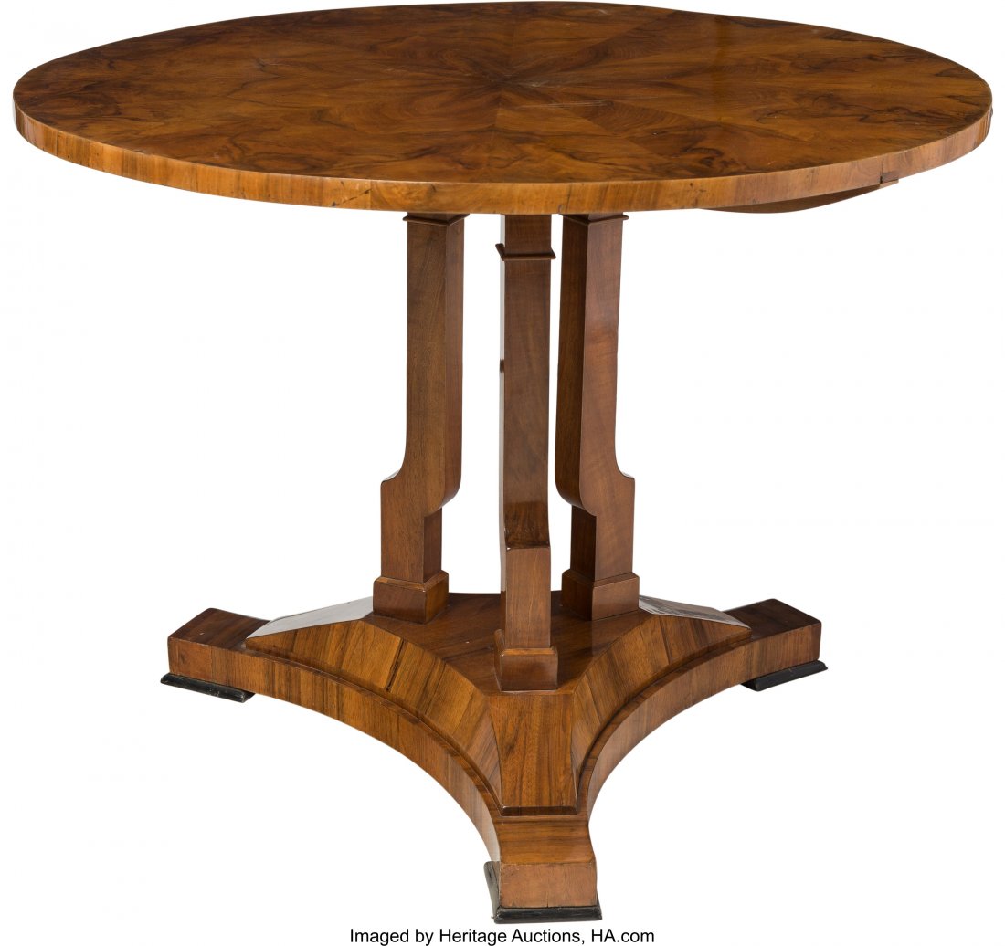 An Austrian Biedermeier Figured Walnut Center Ta: An Austrian Biedermeier Figured Walnut Center Table, circa 1915 30-1/2 x 42-3/4 inches (77.
