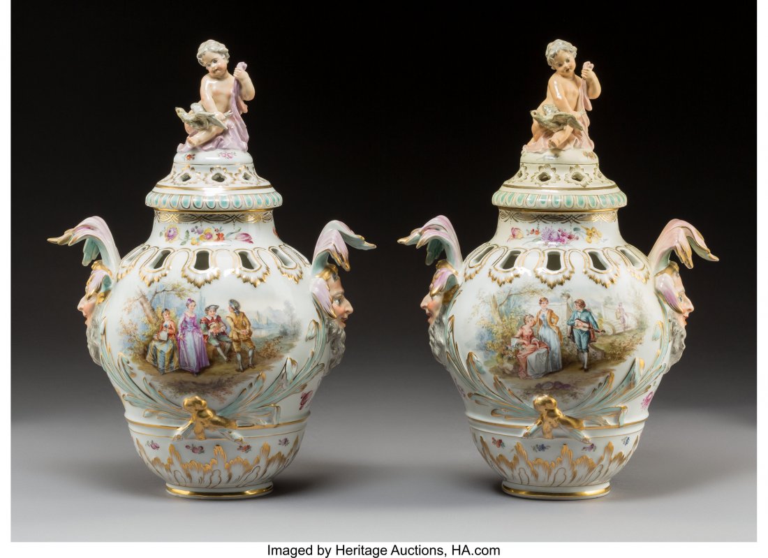 A Pair of KPM-Style Porcelain Potpourri Urns wit: A Pair of KPM-Style Porcelain Potpourri Urns with Lids, Germany, circa 1860Marks: (sc