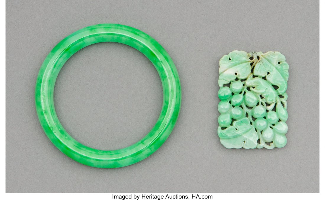 A Chinese Jadeite Bangle and Squirrel and Grapes: A Chinese Jadeite Bangle and Squirrel and Grapes Pendant