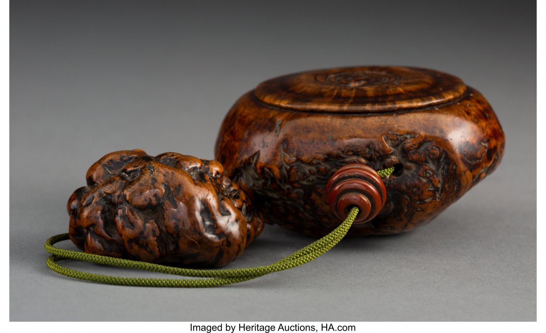 A Burl Tonkotsu with Burl Netsuke and Tsuishu La: A Burl Tonkotsu with Burl Netsuke and Tsuishu Lacquer Ojime 1-3/4 x 3-5/8 x 3-3/4 inches (4