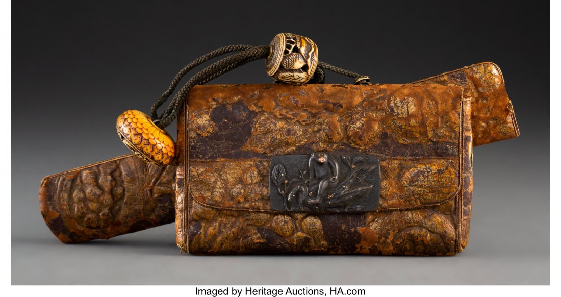 A Dutch Foil-Embossed Tobacco Pouch and Pipe Cas: A Dutch Foil-Embossed Tobacco Pouch and Pipe Case with Monkey Kanemono and Staghorn Ojime and Netsuke<