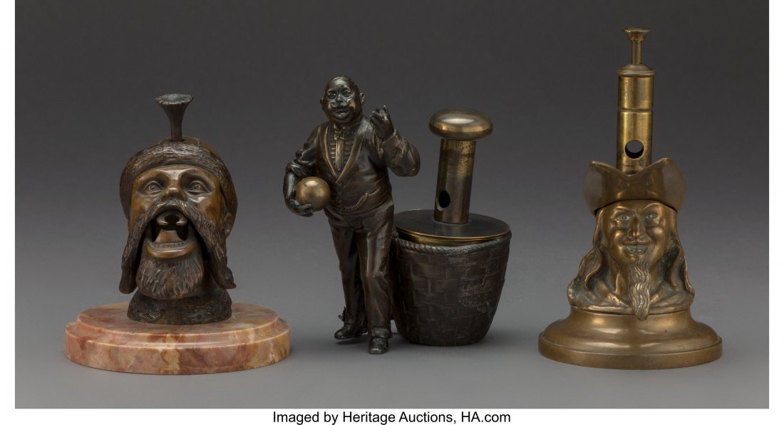 Three Metal Figural Cigar Cutters, late 19th cen: Three Metal Figural Cigar Cutters, late 19th century 7 x 4 x 5 inches (17.8 x 10.2 x 12.7 cm) The lot comprising: 1 head-form bronze cigar cutter on marble base; 1 head-form bronze and brass cigar cut