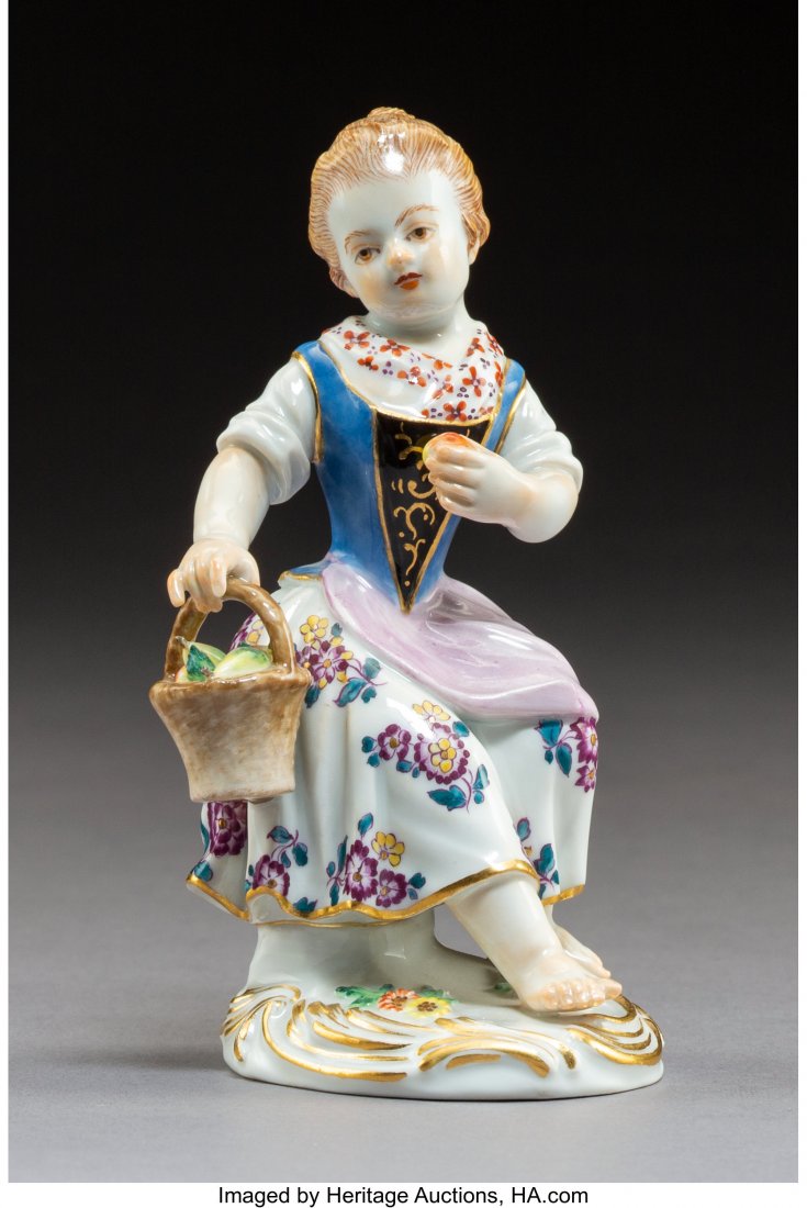 A Meissen Polychromed and Partial Gilt Porcelain: A Meissen Polychromed and Partial Gilt Porcelain Figure of a Girl with Fruit, Meissen, Germany, early 20th century Marks: (crossed swords in blue underglaze), 1490, 60329 4-3/4 x 2-3/4 x 2-3/4 inches