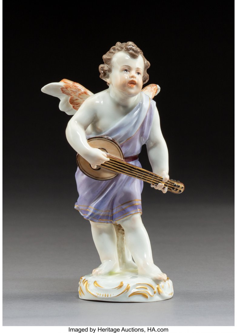 A Meissen Polychromed and Gilt Porcelain Cupid w: A Meissen Polychromed and Gilt Porcelain Cupid with Mandolin Figure, Meissen, Germany, modeled1892, 20th century Marks: (crossed swords in underglaze blue), O193, 40, 111 6-1/4 x 3-1/4 x 2-5/8 inches
