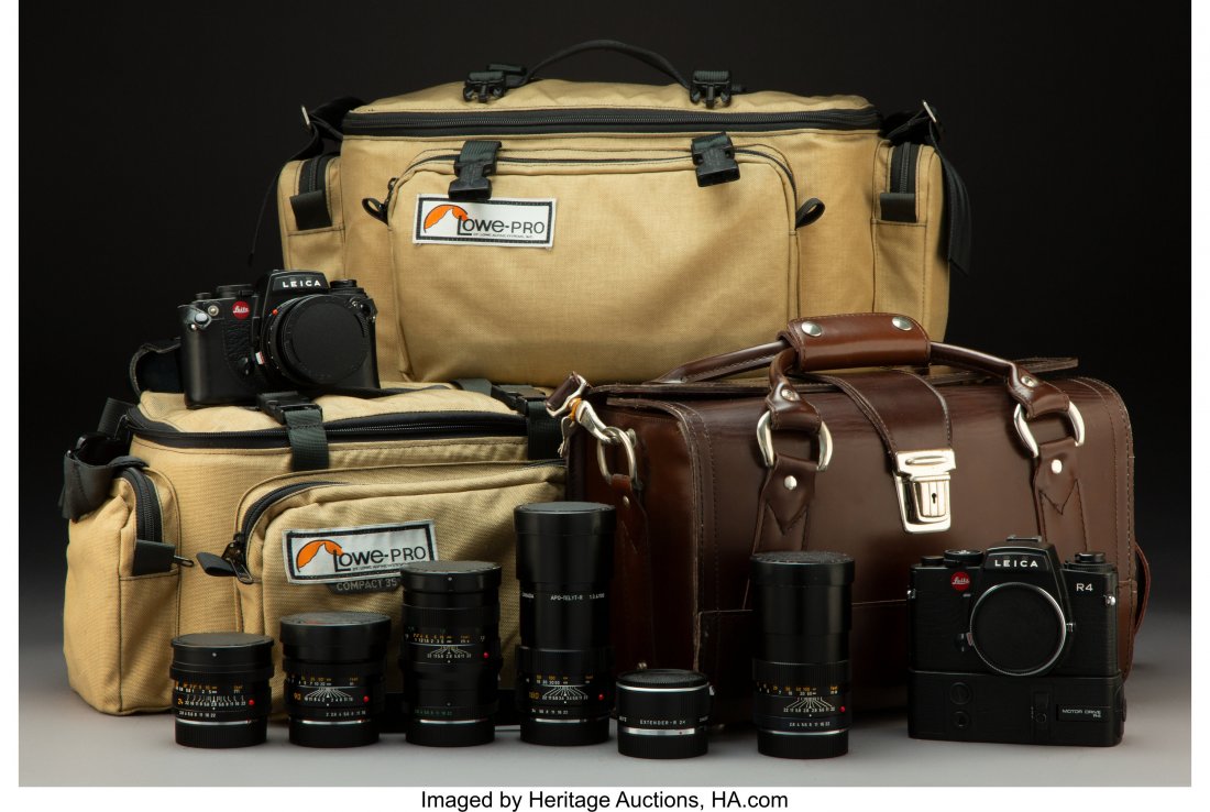 A Leica R4 and Leica R4 Motor Drive with Six Len: A Leica R4 and Leica R4 Motor Drive with Six Lenses, Accessories, and Original Cases, 20th century Marks: (various) 5-1/4 x 5-3/4 x 3 inches (13.3 x 14.6 x 7.6 cm) HID03101242017