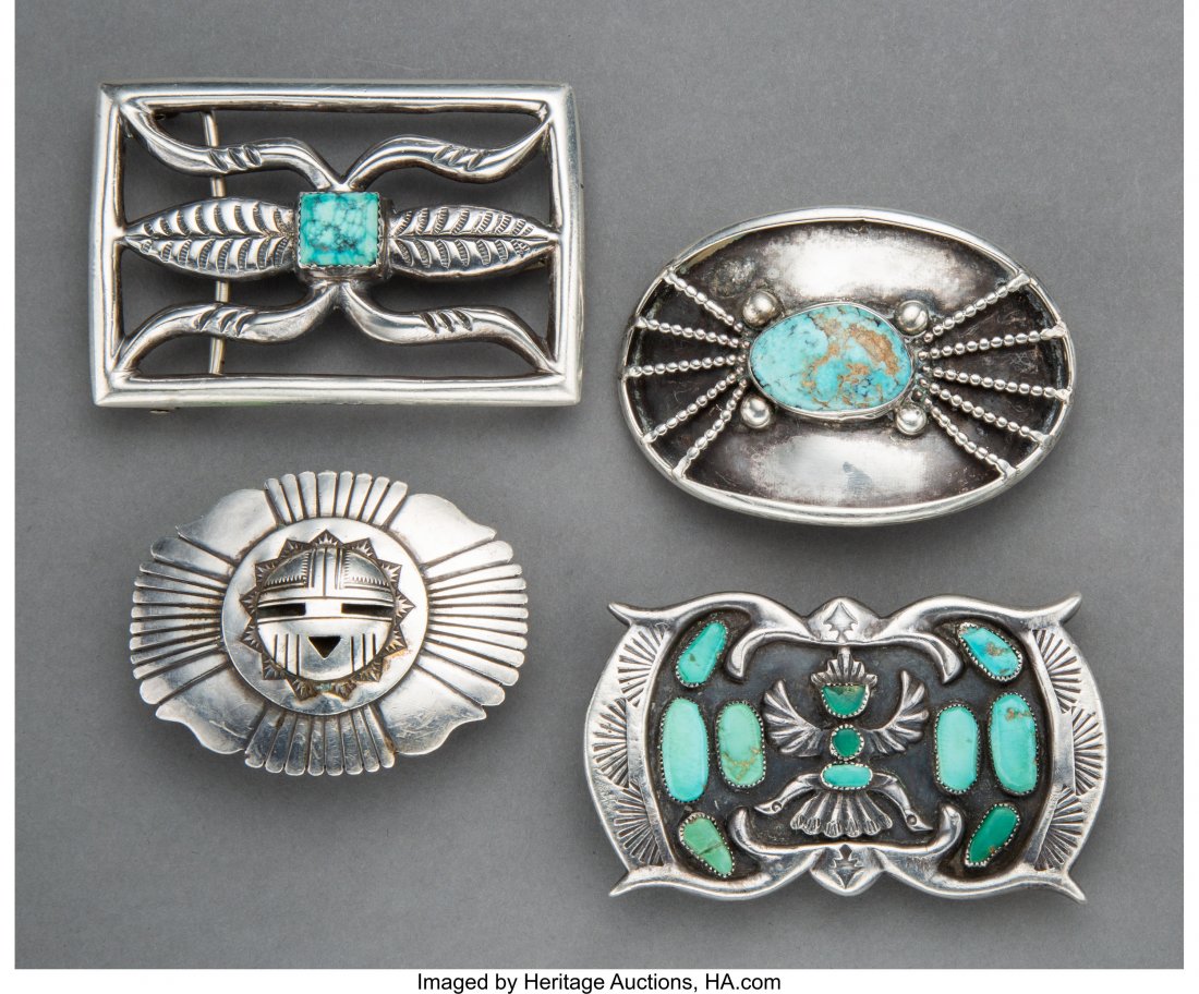 Four Southwest Belt Buckles c. 1950 - 1970 inc: Four Southwest Belt Buckles c. 1950 - 1970 including three Navajo examples, one stamped Eddy Chaco, Sterling and one Zuni example, stamped H. (Horace) Iule, silver, turquoise Provenance: Dr. & Mrs. Jo