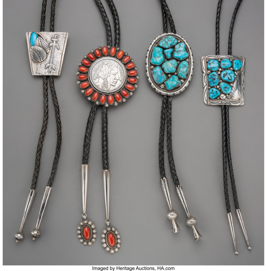 Four Southwest Bolo Ties c. 1980 including a s: Four Southwest Bolo Ties c. 1980 including a sandcast example stamped, MD, Sterling; a coral example inscribed made by: J. Dale, Sterling; and an oval example stamped P. Wheeler, silver, turquoise, co