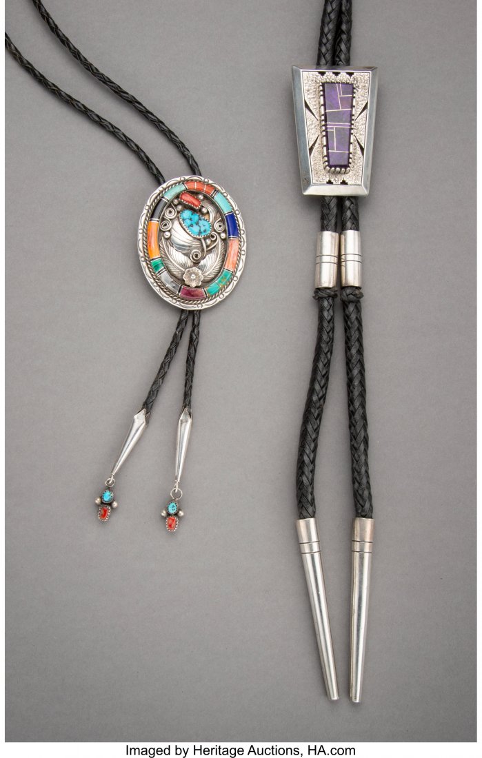 Two Southwest Bolo Ties one stamped BJ, Sterli: Two Southwest Bolo Ties one stamped BJ, Sterling; the other, Navajo, stamped Brian Tso, Sterling Provenance: Dr. & Mrs. John Finley Heights of slides: 2 ½ inches each HID03101242017
