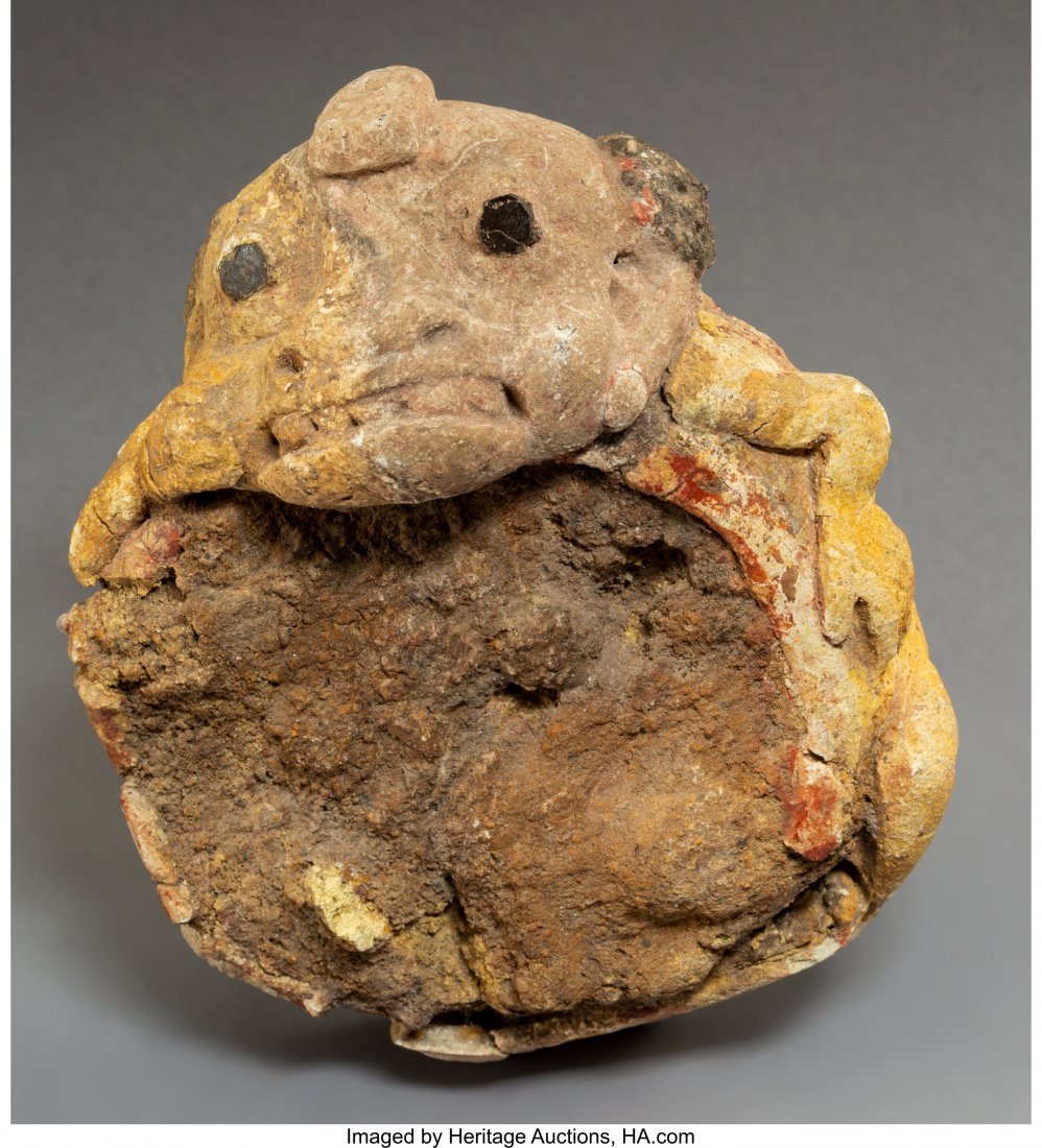 An Olmec-Las Bocas Toad Mirror c. 800-500 BC: An Olmec-Las Bocas Toad Mirror c. 800-500 BC The earthenware toad crouching or reclining on its back holding a large corroded circular pyrite mirror on its belly. The eyes circular pieces of anthracit