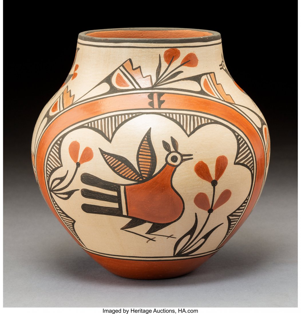 A Zia Polychrome Jar Elizabeth Medina signed: A Zia Polychrome Jar Elizabeth Medina signed near the base, Elizabeth Medina, Zia Height: 9 ¼ inches HID03101242017