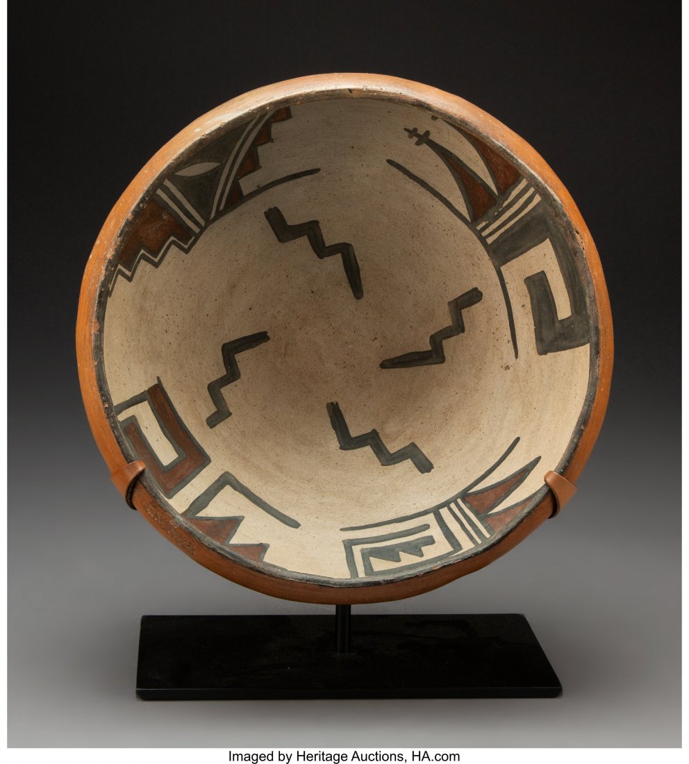 A San Ildefonso Polychrome Bowl c. 1907 clay,: A San Ildefonso Polychrome Bowl c. 1907 clay, paint, with custom metal stand Provenance: Professor Julia R. Weertman Collection Diameter: 12 ½ inches HID03101242017