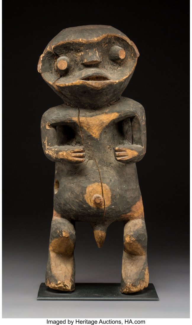 A Large and Important Mambila Figure Cameroon: A Large and Important Mambila Figure Cameroon Wood, mostly covered with a black pigment. A large hole drilled on proper right side of abdomen. Provenance: Dr. & Mrs. John Finley Collected in situ Augu