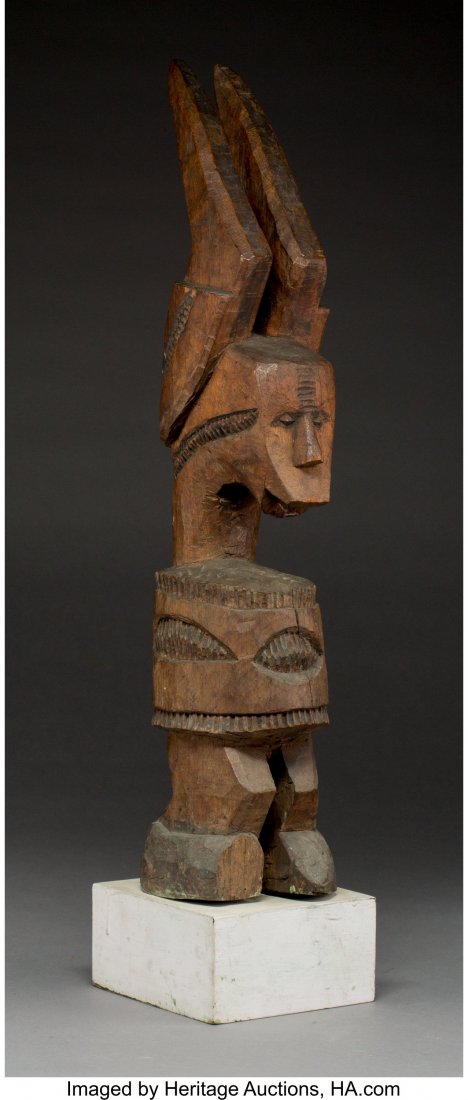 An Ikenga Figure Nigeria Standing figure with: An Ikenga Figure Nigeria Standing figure with horns. Provenance: Dr. & Mrs. John Finley Christie's South Kensington, October 2, 1990, Lot 279 Lt. Gen. Ahlf. Pitt Rivers W.D. Webster, collected Novembe
