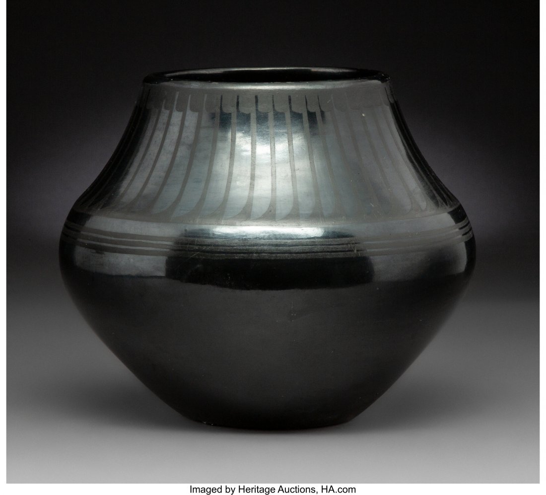 A San Ildefonso Blackware Jar Maria and Santana: A San Ildefonso Blackware Jar Maria and Santana Martinez c. 1950 clay, paint, signed on the base Marie + Santana Provenance: The Estate of Stanley Shapiro, sold to benefit charity Diameter: 9 ½