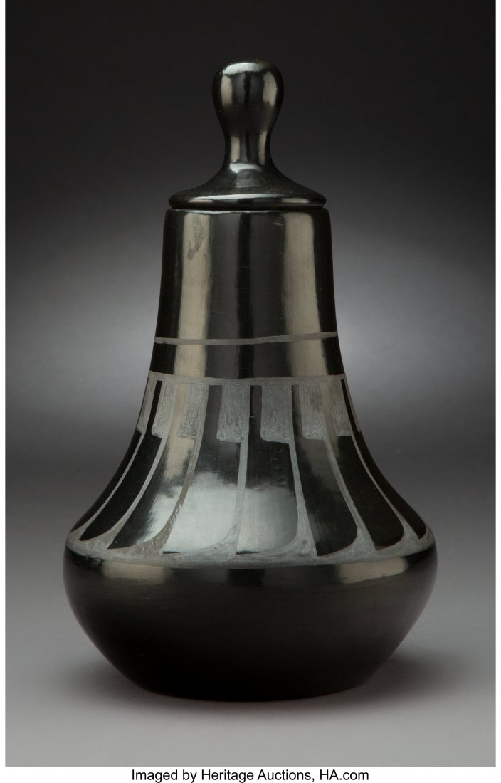 A San Ildefonso Lidded Blackware Vase Linda Dunl: A San Ildefonso Lidded Blackware Vase Linda Dunlap c. 1983 clay, paint, signed on the base, Linda Dunlap, San Ildefonso Pueblo, 1983 Provenance: William & Sheryl Sloup Collection Height: 10 inches, in