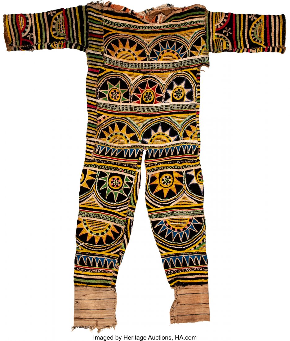 An Igbo Dance Costume Provenance: Dr. & Mrs. J: An Igbo Dance Costume Provenance: Dr. & Mrs. John Finley Height: 49 inches HID03101242017