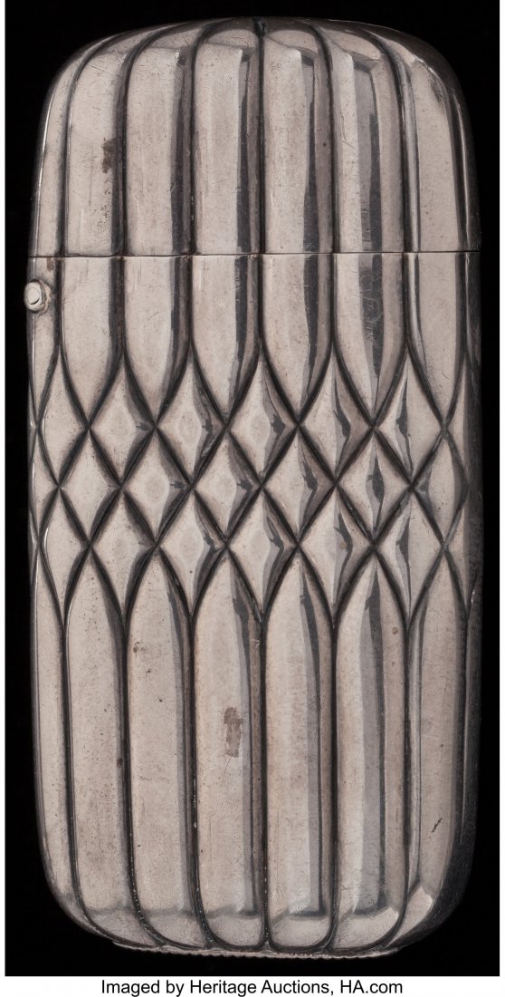 A TIFFANY & CO. WHITE ALLOY MATCH SAFE, New York: A TIFFANY & CO. WHITE ALLOY MATCH SAFE, New York, New York, circa 1900 Marks: TIFFANY & CO. 2-1/2 inches high (6.4 cm) FROM THE ESTATE OF JOHN O. ANTONELLI The match safe with repoussé 