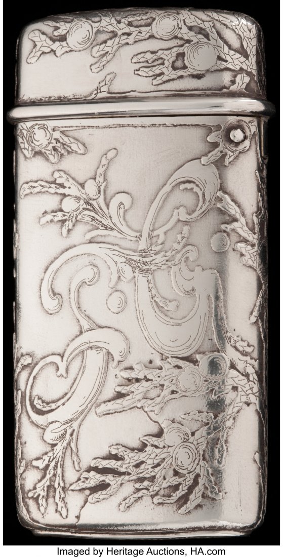 A TIFFANY & CO. SILVER AND SILVER GILT MATCH SAF: A TIFFANY & CO. SILVER AND SILVER GILT MATCH SAFE, New York, New York, circa 1882-1891 Marks: TIFFANY & CO., STERLING, 39, 7127, M, 7397 2-1/2 inches high (6.4 cm) 1.36 troy ounces From the Es