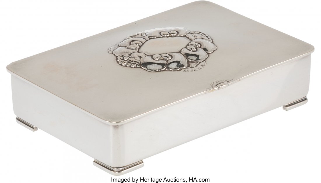 A Gundorph Albertus for Georg Jensen Silver and : A Gundorph Albertus for Georg Jensen Silver and Wood Cigarette Box, Copenhagen, Denmark, mid-20th century Marks: DESSIN, GA, J, 925.S, DENMARK, STERLING, 507B 1-3/8 x 5-3/4 x 3-3/4 inches (3.5 x 14.6 