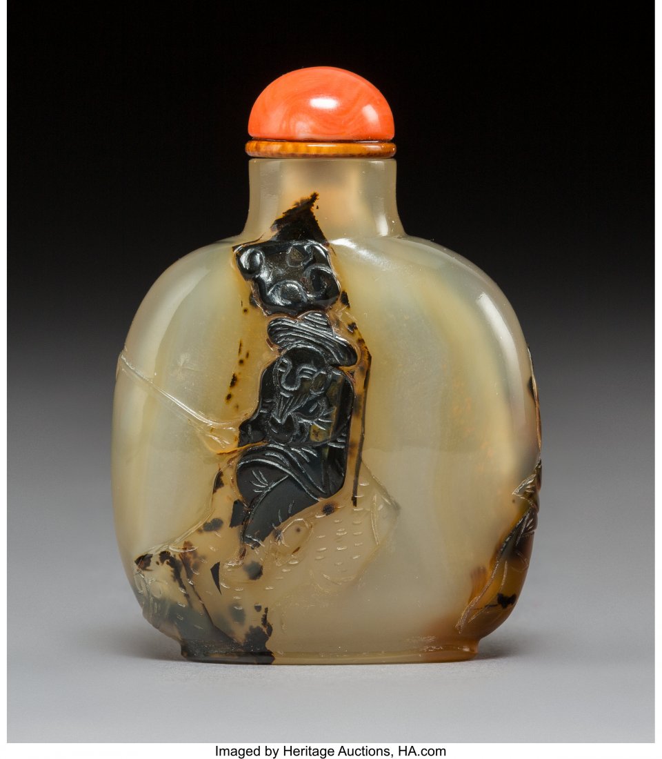 A Chinese Silhouette Carved Chalcedony Snuff Bot (1 of 2)