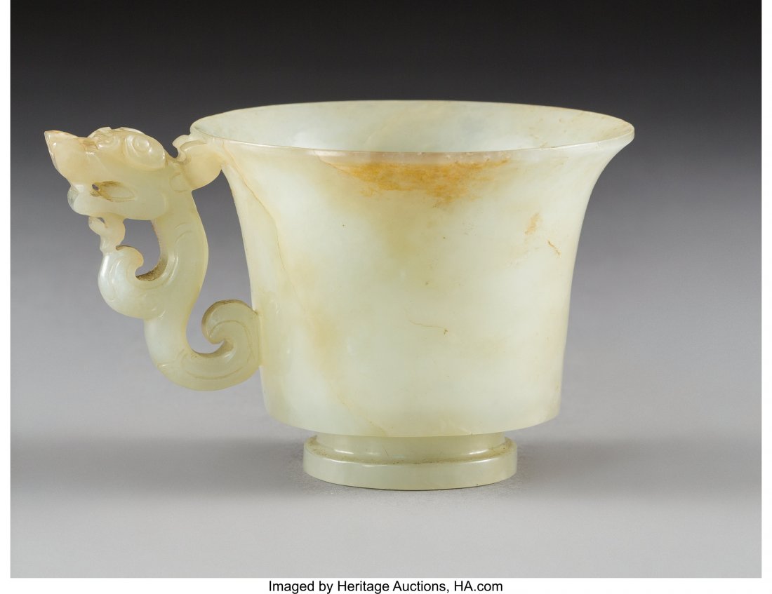 A Chinese Carved White and Russet Jade Cup, late (1 of 2)