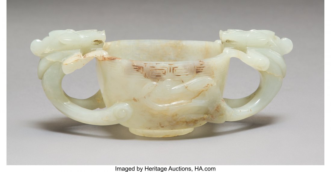 A Chinese Carved Celadon Jade Twin-Handled Cup, (1 of 2)