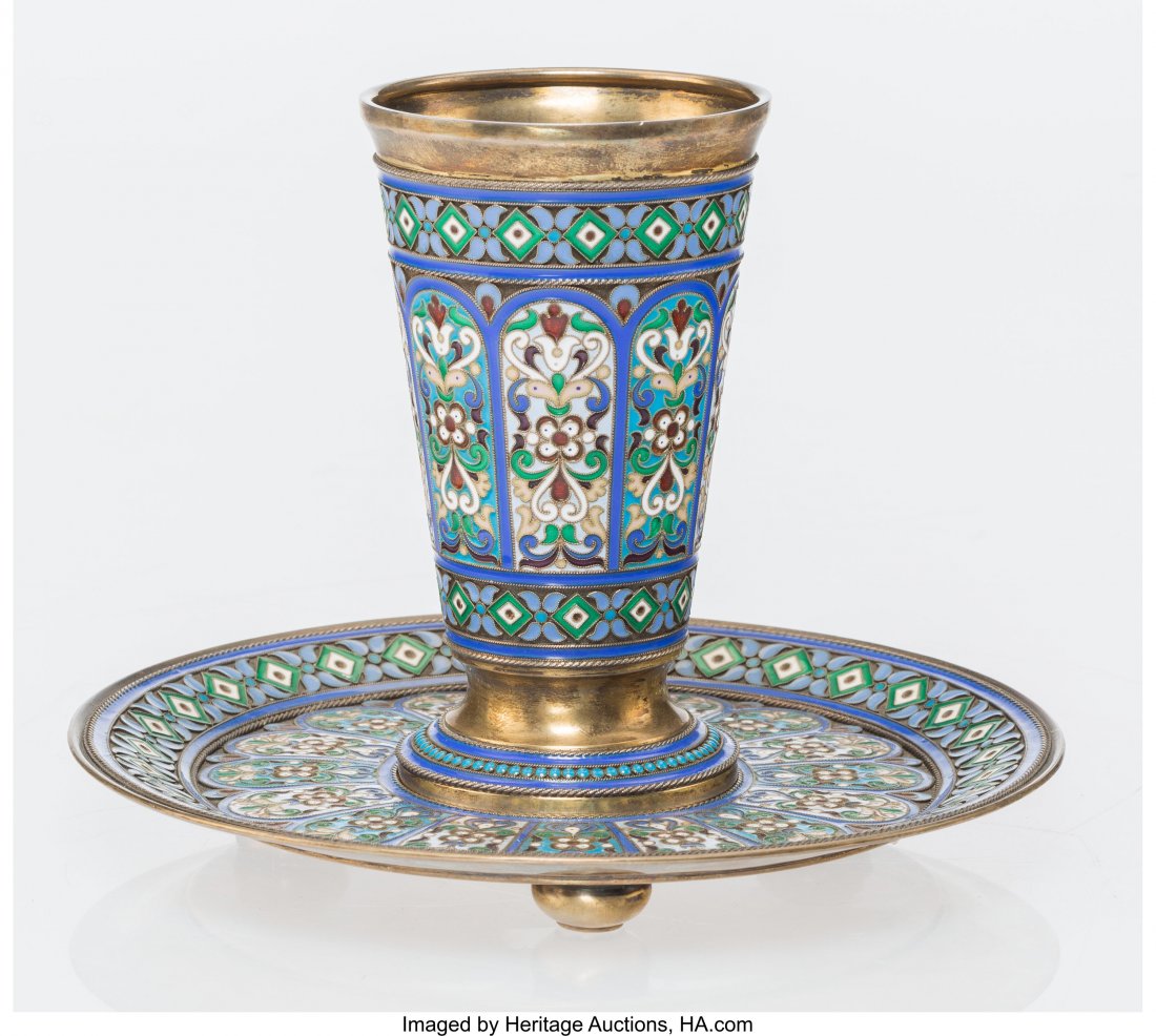 A Russian Cloisonné Enameled and Gilt Sil: A Russian Cloisonné Enameled and Gilt Silver Cup and Saucer, Moscow, mid-late 19th century Marks: (double headed eagle), HK, 1889, 88, (St. George), (Cyrillic maker's mark) 4-3/4 x 2-5/8 inches