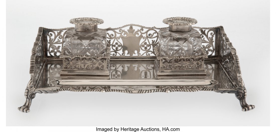 A William Hutton and Sons Silver and Cut Glass D: A William Hutton and Sons Silver and Cut Glass Double Inkwell, London, 1901 Marks: (lion passant), (leopard), f, W H & SS. LD. 2-3/8 x 9-1/4 x 6-1/4 inches (6.0 x 23.5 x 15.9 cm) 21 troy ounces (n