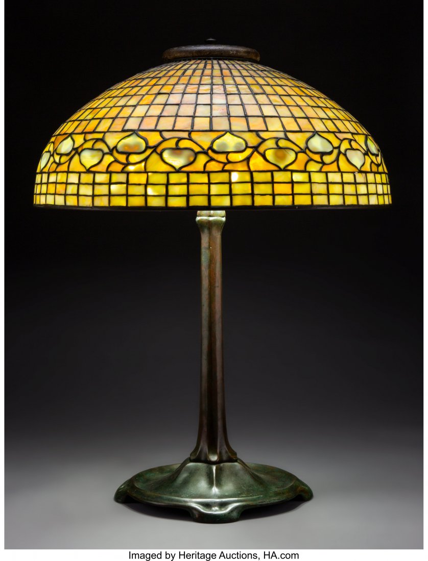 Tiffany Studios Leaded Glass and Bronze Lemon Le: Tiffany Studios Leaded Glass and Bronze Lemon Leaf Table Lamp, circa 1910 Marks to shade: TIFFANY STUDIOS, NEW YORK, 1498 Marks to base: TIFFANY STUDIOS, NEW YORK, 531 26 x 20-1/4 x 20-1/4 inches (66.