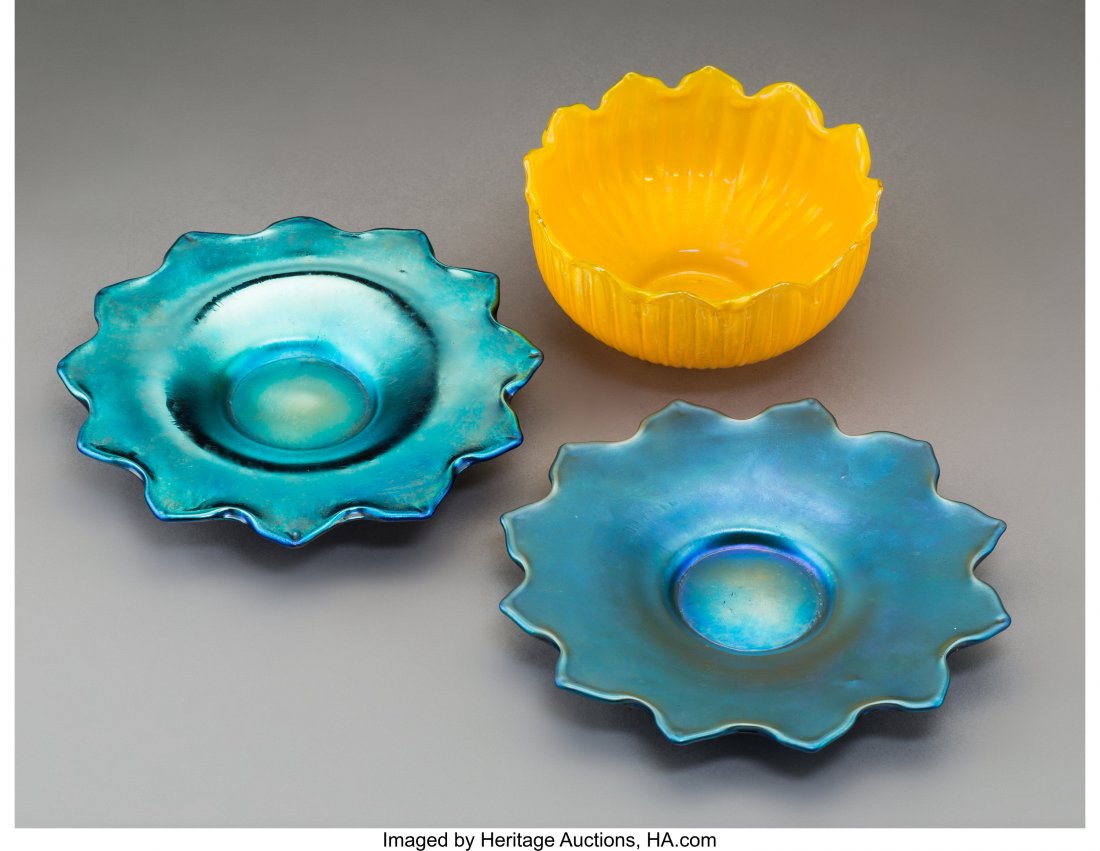 Two Loetz Silberiris Underplates and One Figural: Two Loetz Silberiris Underplates and One Figural Lotus Flower Bowl, circa 1920 Marks: CZECHO-SLOVAKIA 8 inches (20.3 cm) (underplate) The lot comprising: 1 Lotus Flower bowl; 2 Silberiris underplates.