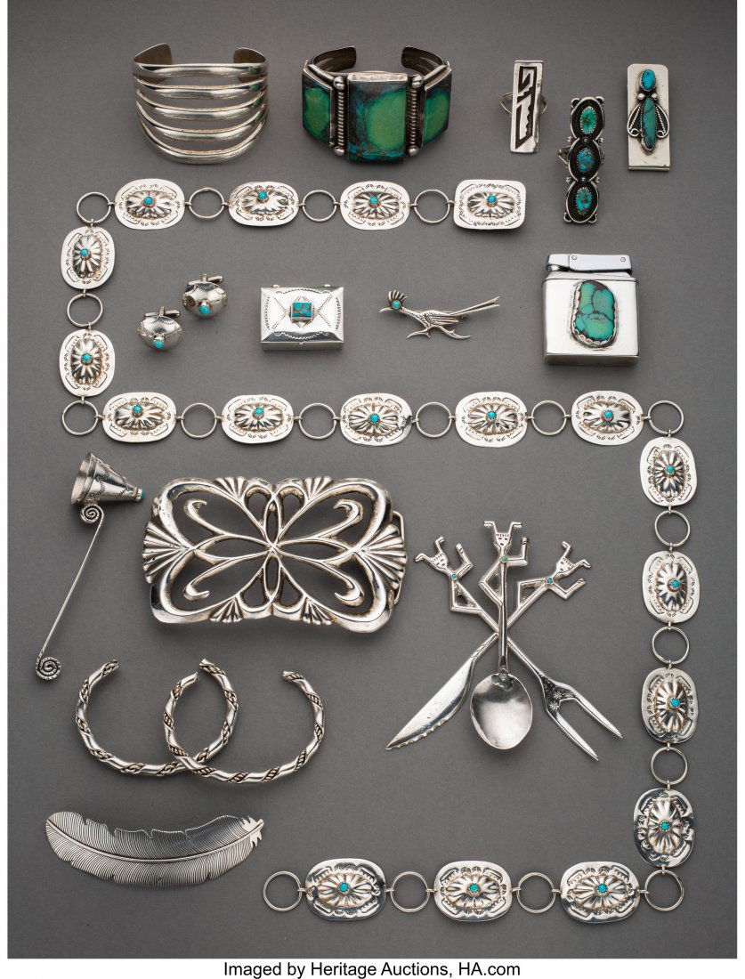 Eighteen Navajo Jewelry Items c. 1950 - 1980: Eighteen Navajo Jewelry Items c. 1950 - 1980 including two cuff bracelets; two rings; a money clip; a link belt; a pair of cufflinks; a pill box; a pin; a lighter; a candle snuffer; a belt buckle; thr