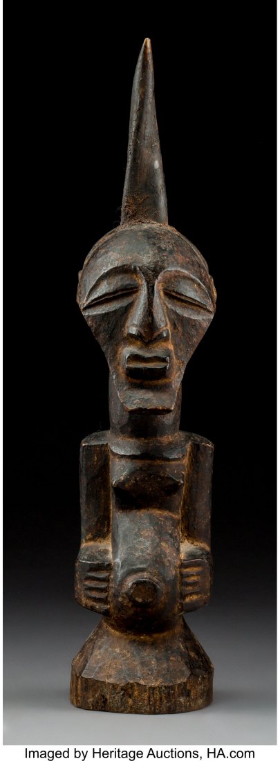 A Songye Half Figure With Horn Provenance: Dr. : A Songye Half Figure With Horn Provenance: Dr. & Mrs. John Finley Height: 16 inches HID03101242017