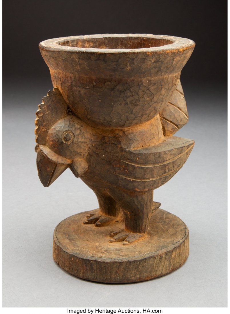 A Yoruba Divination Cup Provenance: Collected : A Yoruba Divination Cup Provenance: Collected by Texas artist Otis Dozier. Through the family by descent. Height: 7 &frac14; inches HID03101242017