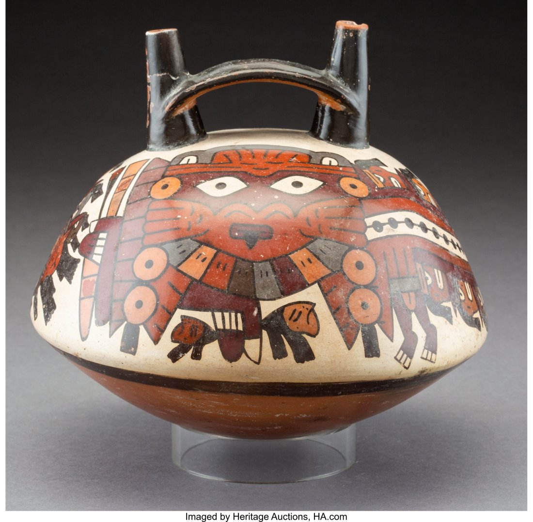 A Large Nazca Polychrome Vessel Peru, c. 100 BC: A Large Nazca Polychrome Vessel Peru, c. 100 BC – 800 AD Hollow earthenware flattened globular bridge-spout vessel with bright polychrome paints, depicting two Anthropomorphic Mythical Beings wi