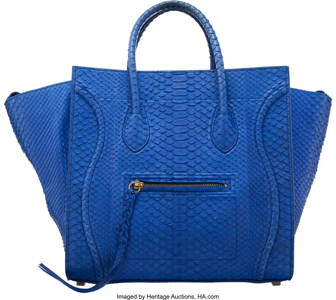 Celine Blue Python Phantom Tote Bag Condition: 3: Celine Blue Python Phantom Tote Bag Condition: 3 20" Width x 11.5" Height x 10" Depth This bag is done in Blue Python Skin with Gold Hardware, featuring rolled python handles, and one exterior zippere