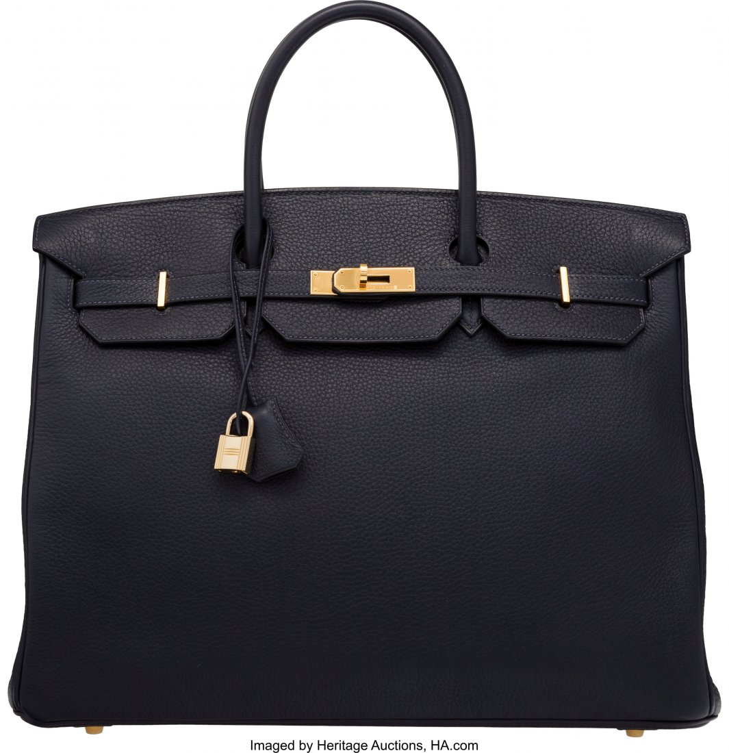 Hermès Indigo Clemence Leather Birkin Bag: Hermès Indigo Clemence Leather Birkin Bag with Gold Hardware G Square, 2003 Condition: 3 15.5" Width x 11" Height x 8" Depth This bag is done in Indigo Clemence Leather with Gold Hardware, featuring 