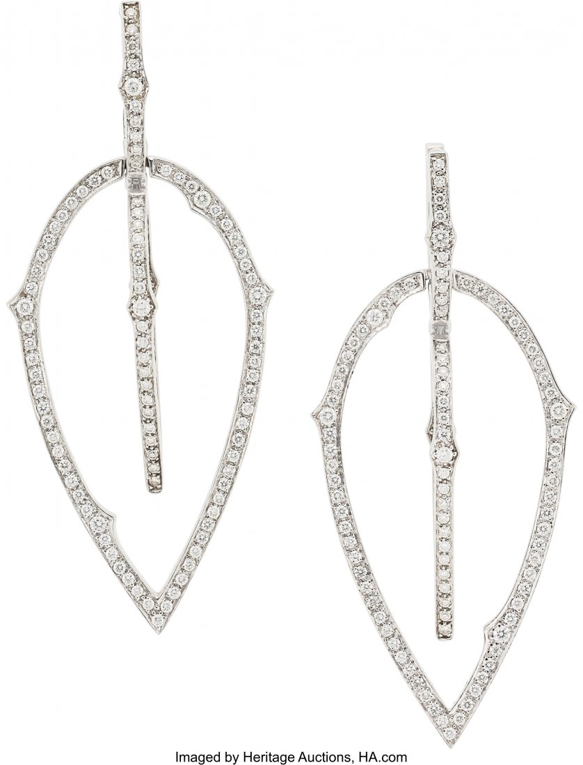 Diamond, White Gold Earrings, Stephen Webster: Diamond, White Gold Earrings, Stephen Webster The Thorn earrings feature full-cut diamonds weighing a total of 1.07 carats, set in 18k white gold, marked Stephen Webster. Gross weight 13.90 grams. Dim