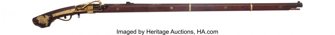 Early Edo Period Japanese Matchlock Musket. Un: Early Edo Period Japanese Matchlock Musket. Unserialized, .62 caliber, 39-inch octagonal barrel with fixed front sight and fixed grooved-block rear sight. Decorative silver mon and kanji etched to the