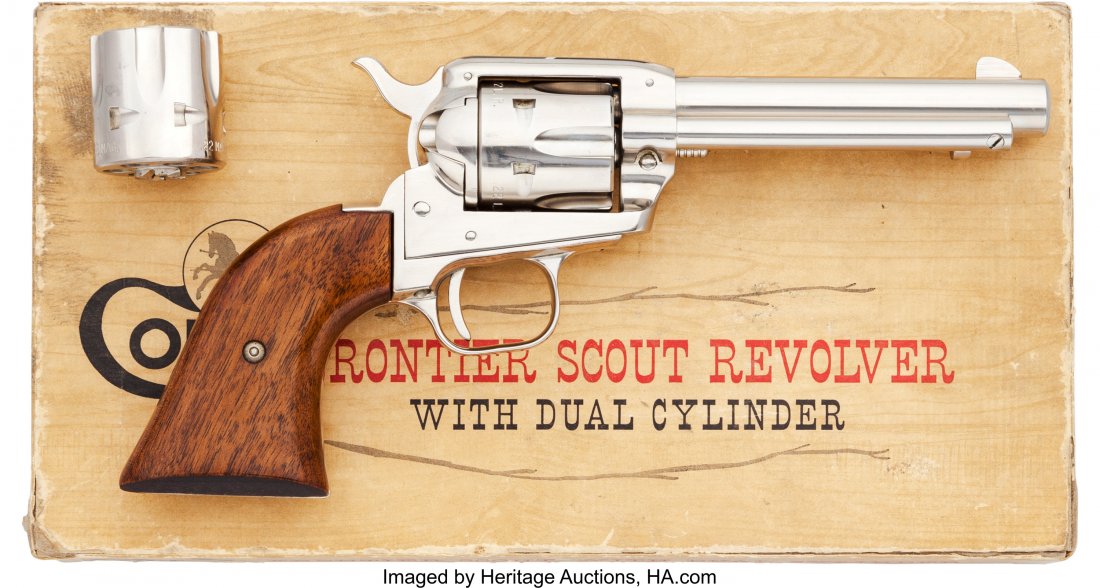 Boxed Colt Frontier Scout Single Action Revolver: Boxed Colt Frontier Scout Single Action Revolver. Serial no. 33645K, .22 long caliber, 4 3/4-inch barrel with fixed front blade sight and frame notch rear sight. Nickel-plated finish. Smooth walnut gr