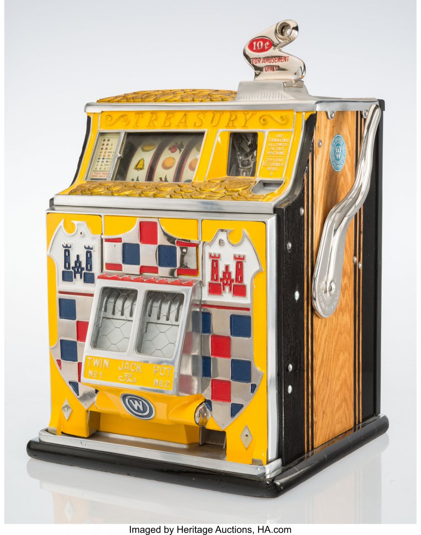 A Watling Scale Co. Inc. Treasury Enameled Metal: A Watling Scale Co. Inc. Treasury Enameled Metal Ten Cent Twin Jackpot Slot Machine with Castle Façade, Chicago, circa 1941 Marks: BLUE SEAL, WATLING, COIN OPERATING MACHINES, GOOD IN 1889 BETT