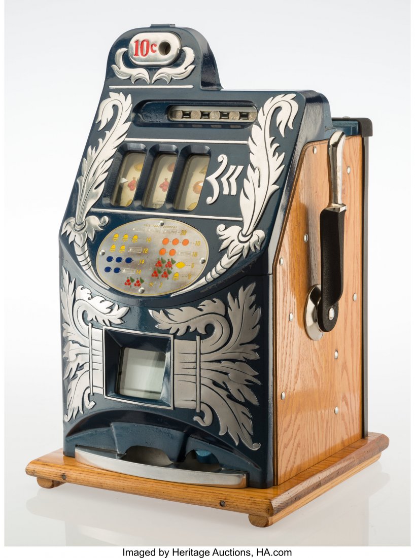 A Mills Novelty Co. Aikens Front Extra Bell Enam: A Mills Novelty Co. Aikens Front Extra Bell Enameled Metal and Oak Ten Cent Three-Reel Slot Machine, Chicago, circa 1946 26-3/4 x 16 x 15 inches (67.9 x 40.6 x 38.1 cm) HID03101062020 © 2020 Heri
