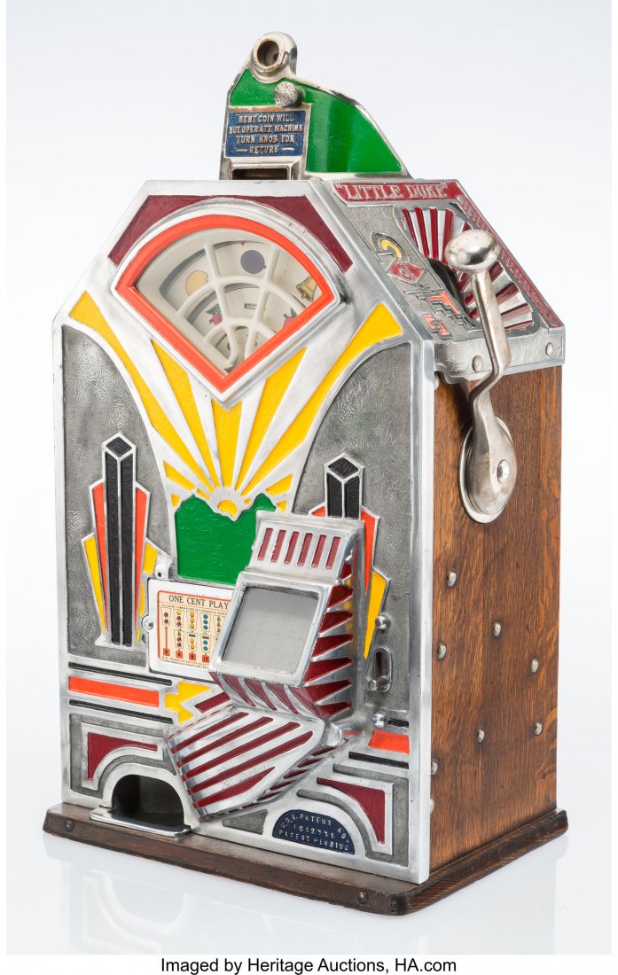 An O.D. Jennings & Co. Little Duke Enameled Meta: An O.D. Jennings & Co. Little Duke Enameled Metal and Oak One Cent Slot Machine, Chicago, circa 1931 Marks: 8346 25-3/4 x 15-1/2 x 12 inches (65.4 x 39.4 x 30.5 cm) HID03101062020 © 2020 Heri