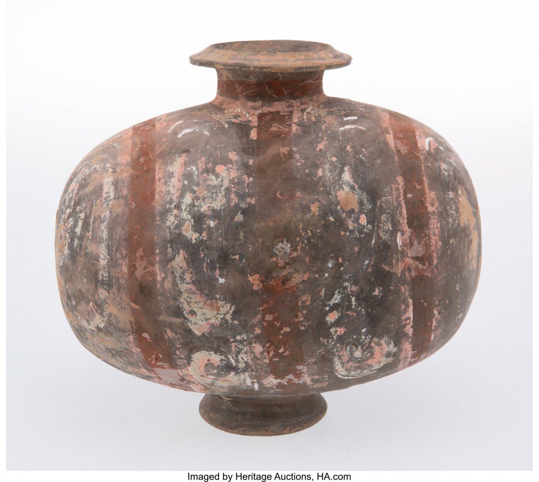 A Chinese Pottery Cocoon Jar, Han Dynasty 11-1/4: A Chinese Pottery Cocoon Jar, Han Dynasty 11-1/4 x 12-3/4 x 9-1/4 inches (28.6 x 32.4 x 23.5 cm) HID03101062020 © 2020 Heritage Auctions | All Rights Reserved