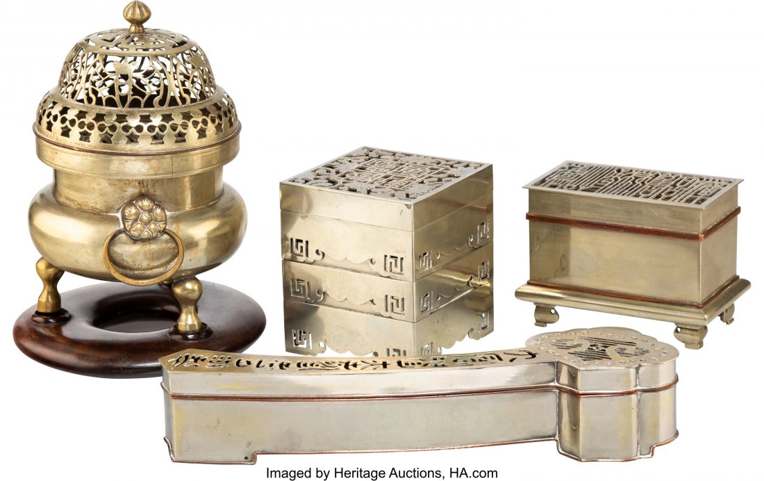 A Group of Four Chinese Paktong Incense Clocks 6: A Group of Four Chinese Paktong Incense Clocks 6-1/2 x 4-1/2 inches (16.5 x 11.4 cm) (tallest) The lot comprising: 1 rectangular incense clock; 1 cubic incense clock; 1 Ruyi scepter form incense cense