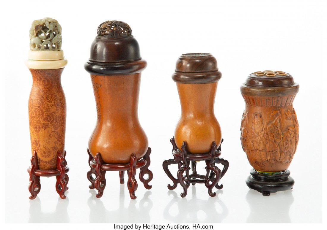 A Group of Four Chinese Moulded Gourd Cricket Ca: A Group of Four Chinese Moulded Gourd Cricket Cages 6-1/2 x 2-3/4 inches (16.5 x 7.0 cm) (largest) The lot comprising: 1 gourd cricket cage with punched wooden covering; 2 carved gourd cricket cages w