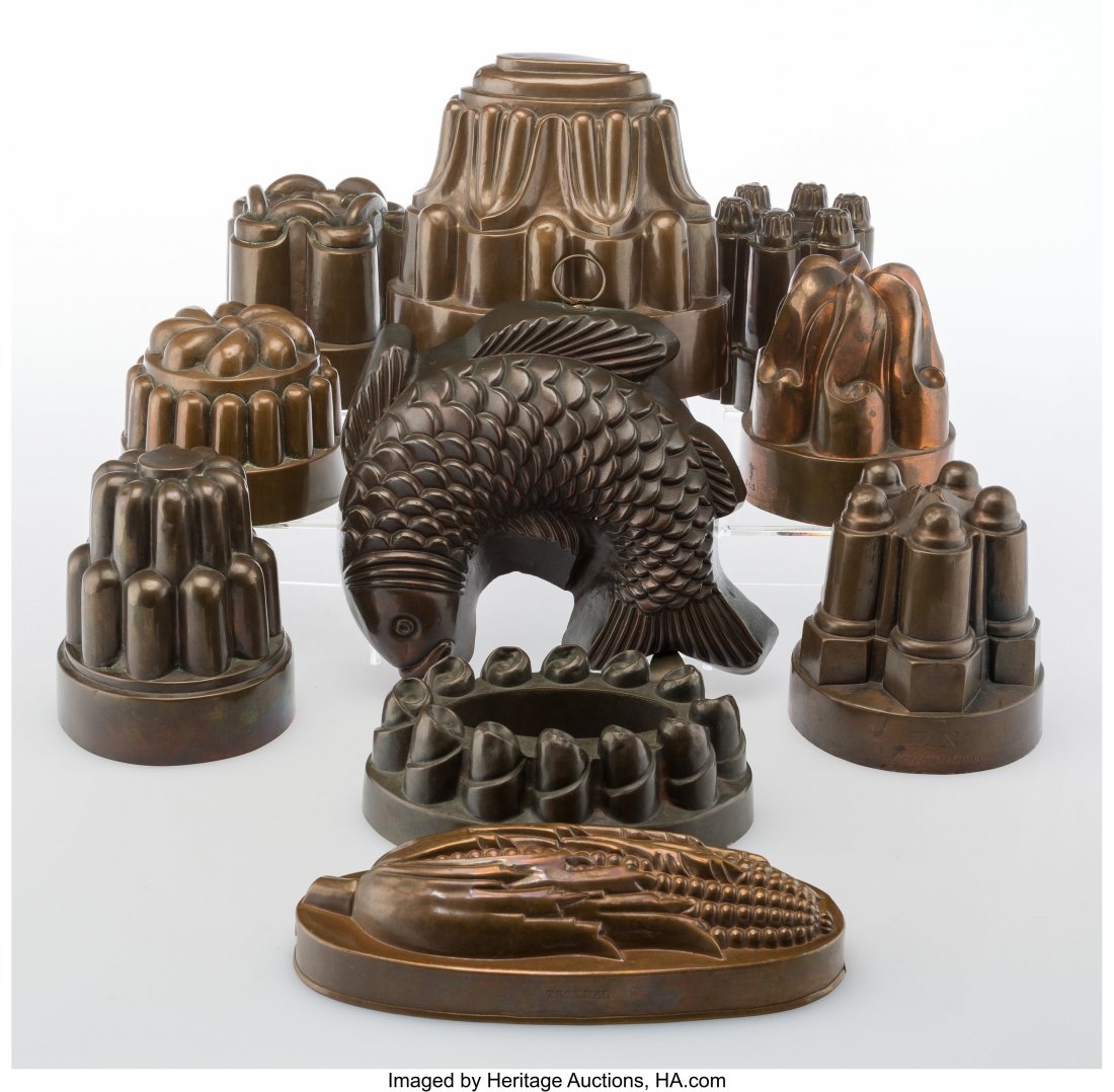 A Group of Ten Copper Pudding Molds, London, 19t: A Group of Ten Copper Pudding Molds, London, 19th century Marks to largest: W.S. ADAMS & SON, IRONMONGER TO THE QUEEN, 57 HAYMARKET 9 x 11-1/2 x 2 inches (22.9 x 29.2 x 5.1 cm) (fish mold) HID0310