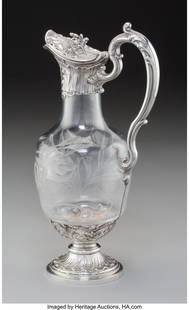 A Robert Linzeler Silver Mounted Intaglio Glass: A Robert Linzeler Silver Mounted Intaglio Glass Claret Jug, Paris, circa 1910 Marks: (crown-RL), PIAULT-LINZELER, (Minerva's head) 11-3/8 x 6 x 4-1/4 inches (28.9 x 15.2 x 10.8 cm) 35.9 ounces (gross)