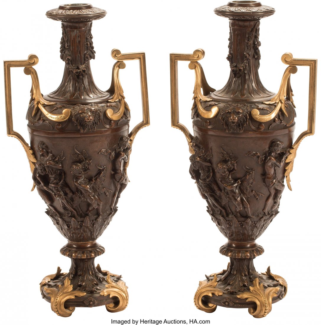 A Pair of French Gilt and Patinated Bronze Urns,: A Pair of French Gilt and Patinated Bronze Urns, 19th century Marks: F. Marechal 21-1/2 x 10 x 8 inches (54.6 x 25.4 x 20.3 cm) (each) The pair of amphora shaped urns, with molded garland swags to nec