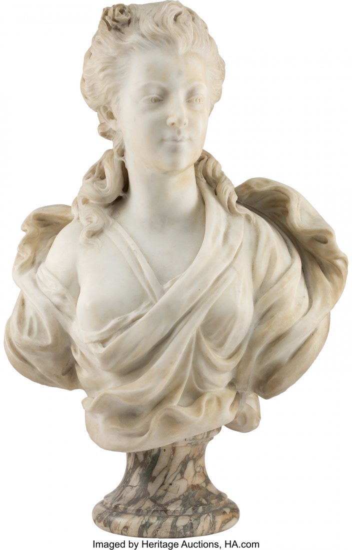 A Continental Marble Female Bust, late 19th-earl: A Continental Marble Female Bust, late 19th-early 20th century 23-1/8 x 20-1/4 x 11 inches (58.7 x 51.4 x 27.9 cm) on a 6 inch (15.2 cm) marble base The marble bust, depicting a lady with flowing garm
